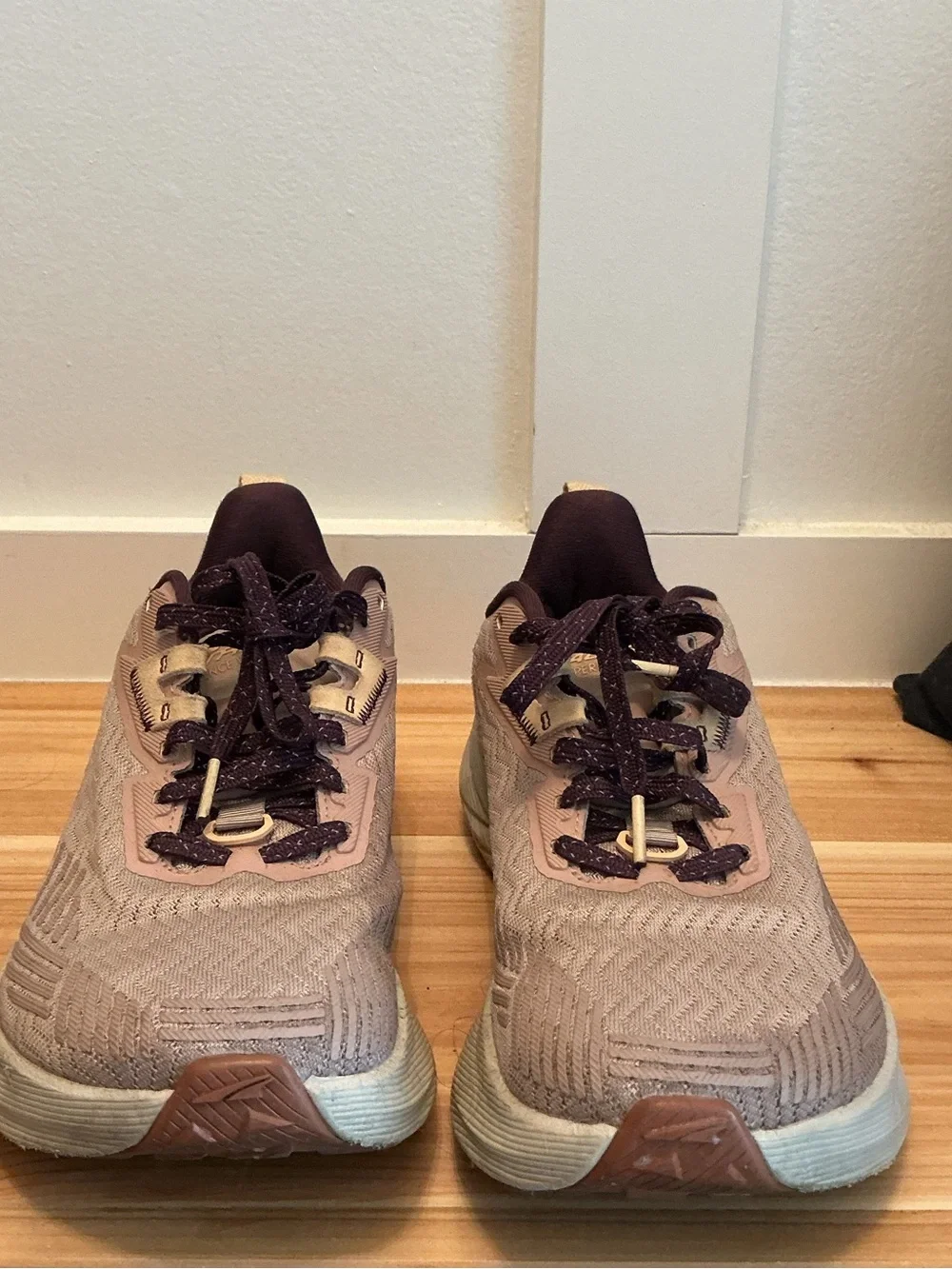 Altra women's sneakers in blush pink with deep plum accents